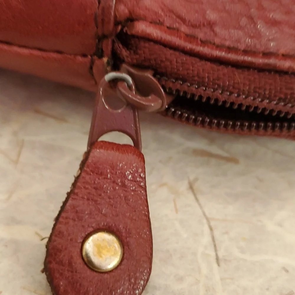 Burgundy color genuine leather eyeglass case. AG